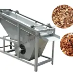 Mashine ya kutenganisha maganda na mbegu za almond ya Taizy inatumiwa kwa kutenganisha mbegu za almond kutoka kwa mchanganyiko wa maganda zilizovunjika na mbegu, yenye uwezo wa kg 400/h.