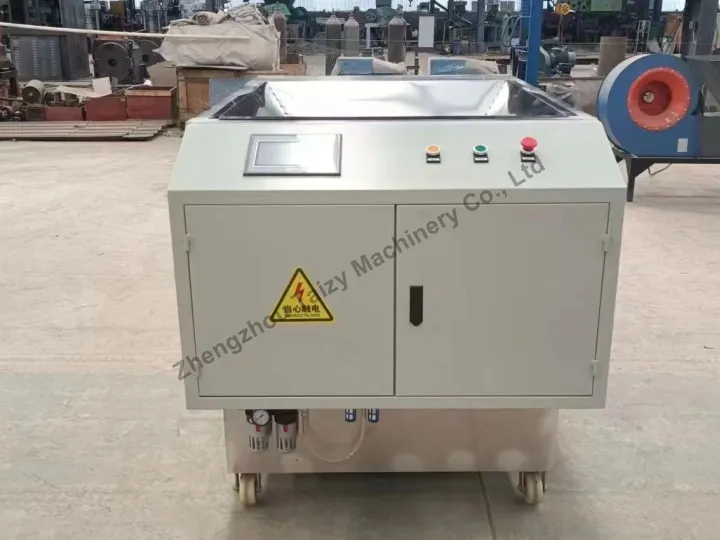 Macadamia nut opening machine