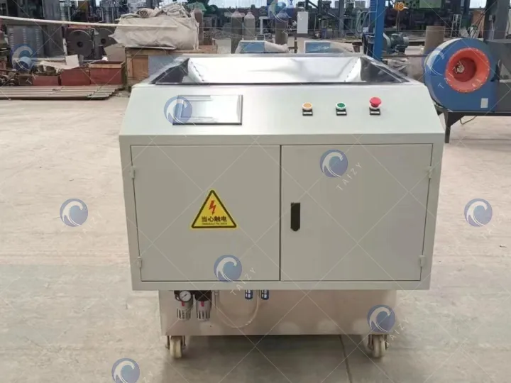 Macadamia nut opening machine